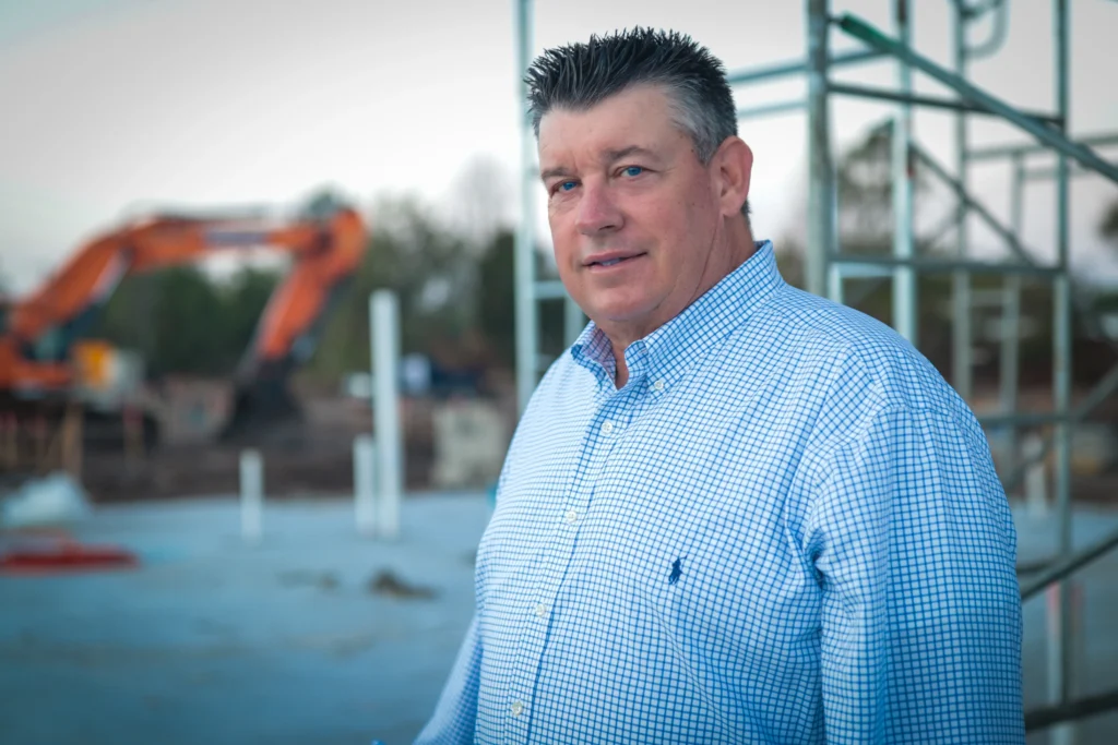 Mike Miller, founder of ILCC and real estate consultant, with 30 years of experience building 5,600+ residential units and managing large-scale development portfolios.