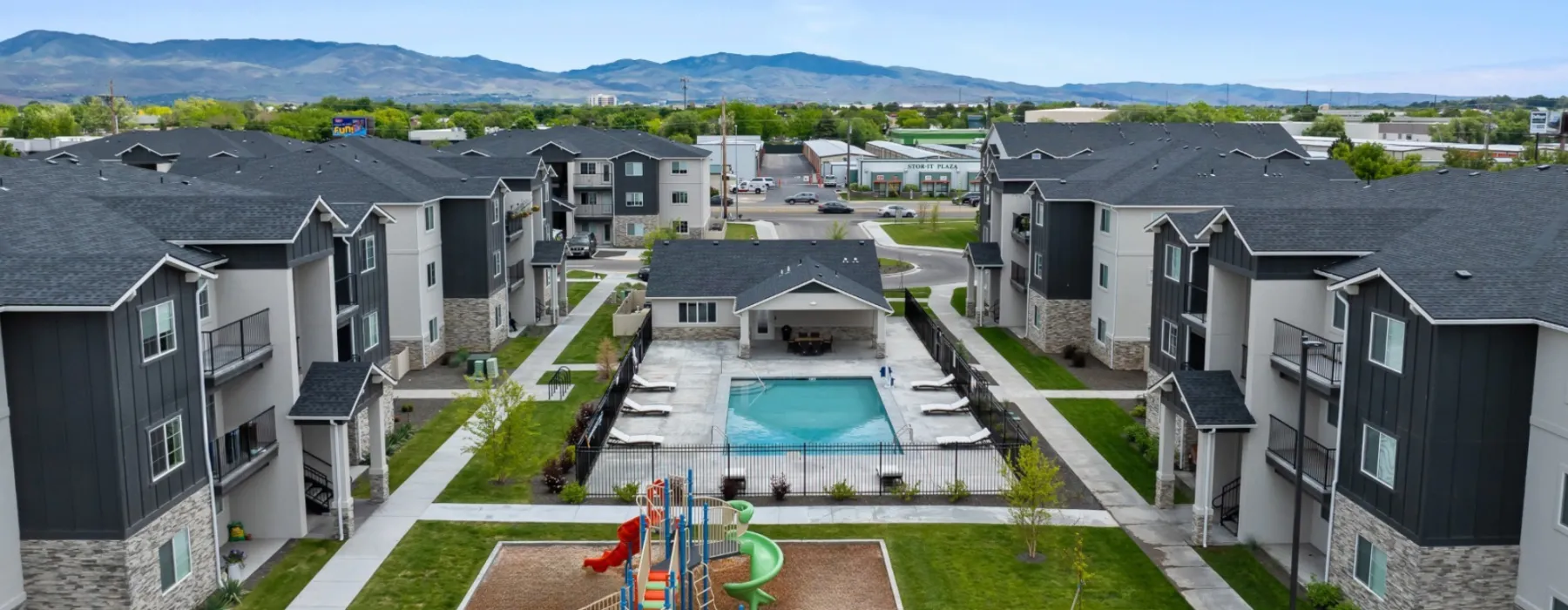 Construction site showing homes in various stages of completion, representing 30 years of ILCC development experience